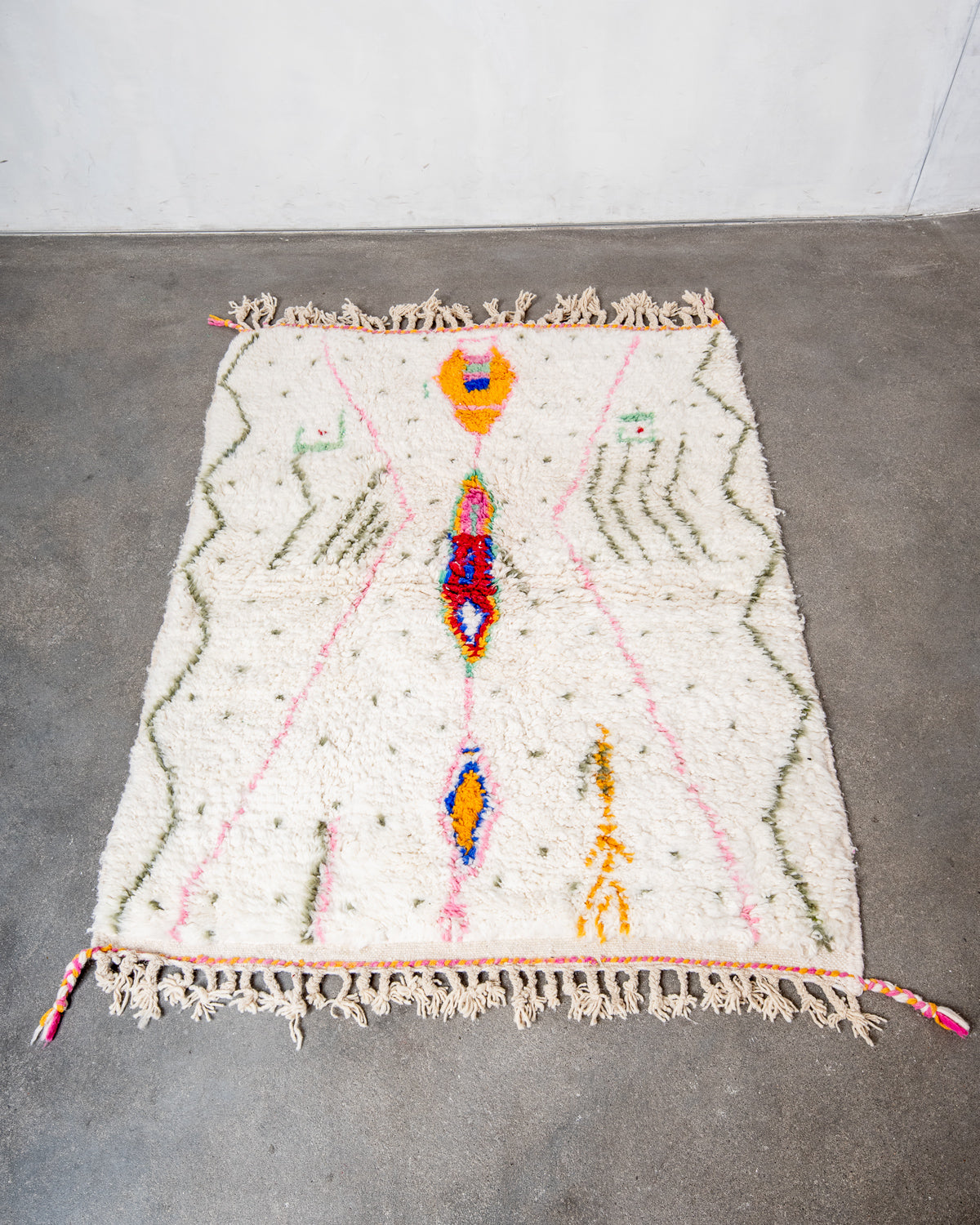 Modern, designer, handcrafted Berber rug from Morocco. Beniourain carpet with beautiful colours and patterns and fluffy wool texture.